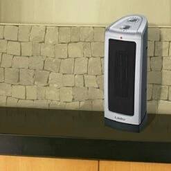 Lasko 5307 Oscillating Ceramic Tower Heater -FRIGIDAIRE Sales Shop lasko oscillating ceramic tower heater 5307 lifestyle 2